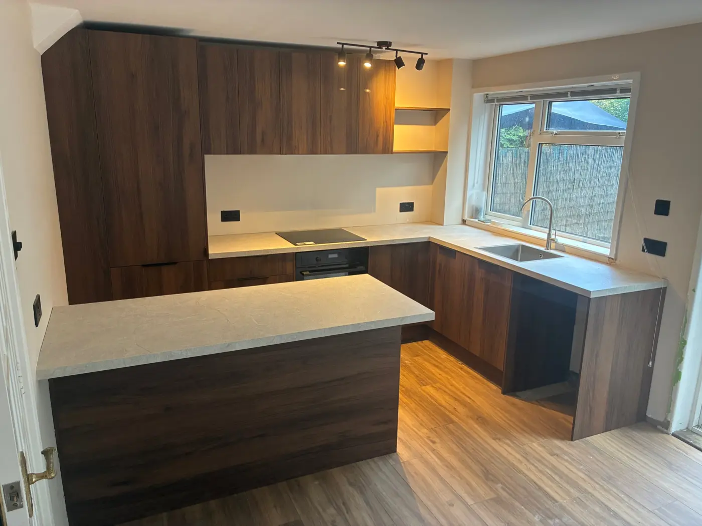The same kitchen from the doorway, ready for the customer's appliances, Harpenden