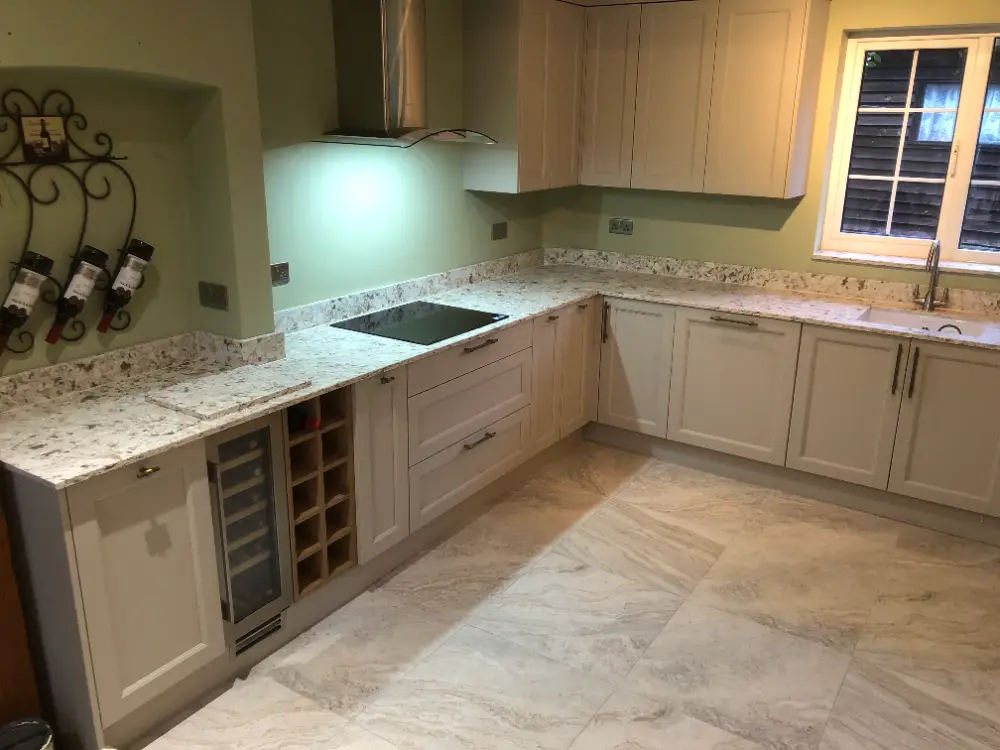 Cream shaker kitchen with wine rack and wine cooler
